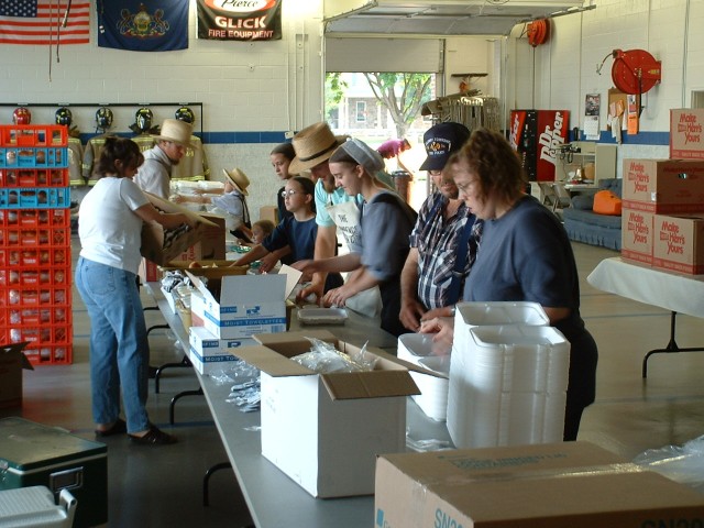 Assembling the boxes and ingredients for the BBQ dinners...